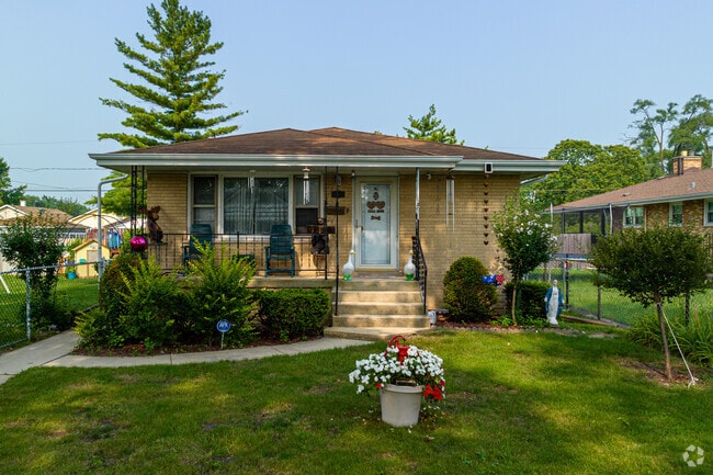 A classic Posen home with a lot of personality in the front yard.