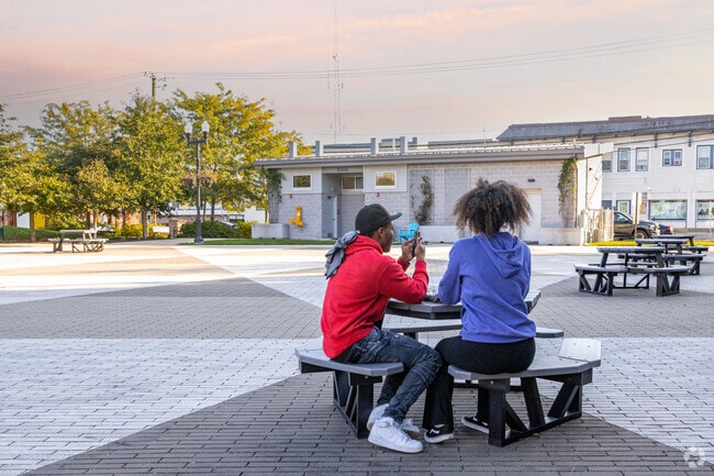 Sit outside with a friend in the courtyards of the Rowan Campus in Glassboro, NJ.