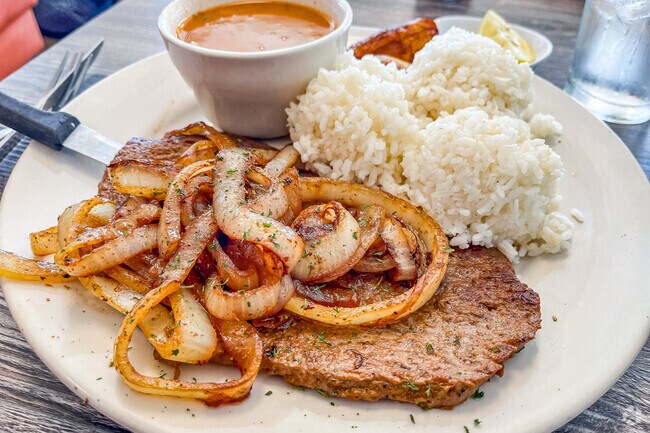 Sink your teeth into the steak and onion dish at Maracas Restaurant near Lake Toho.