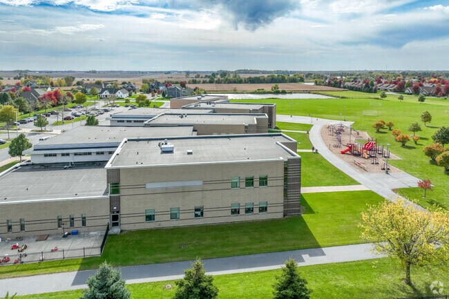 North Grove Elementary School is rurally located across from North Grove Crossing neighborhood.