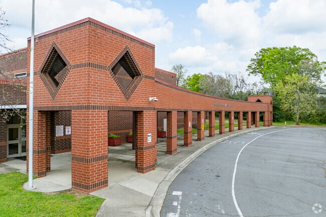 The main entrance of Hawthorne Academy welcomes students.