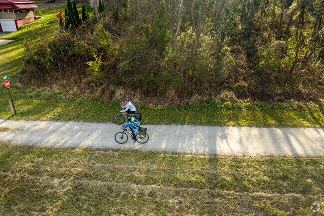 Cyclists enjoy the Great Allegheny Passage near Sewickley Township and West Newton.