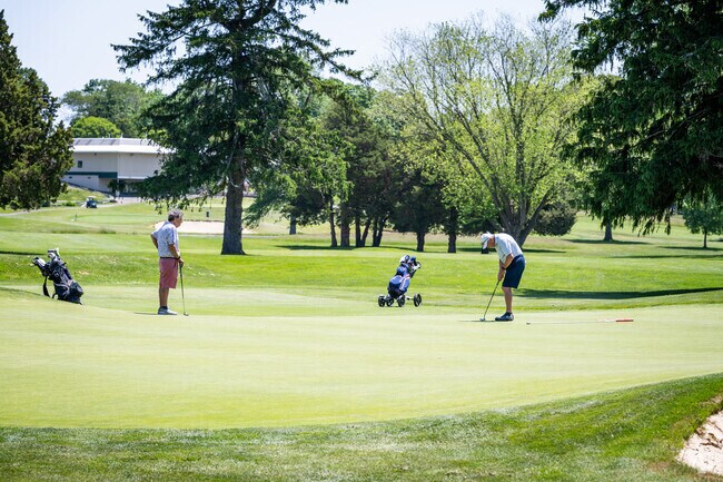 Golf enthusiasts are having a great day at the Potowanut Golf Club in Cowesett, RI.