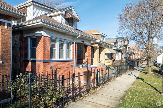 Many homes in Chicago Lawn have fences for added privacy.
