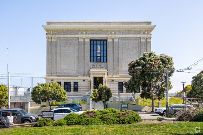 Ida B. Wells High School is a commanding presence on the street.