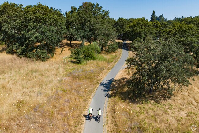 Get your best bike mate and head out to West County Regional Trail in Forestville, California.