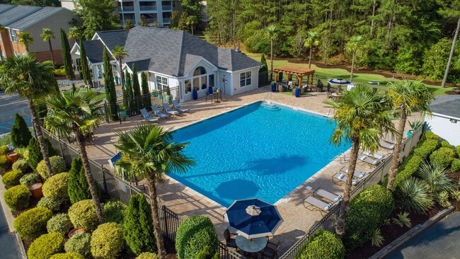 Bask in sun-soaked serenity by our expansive resort-style pool with a sprawling sundeck.