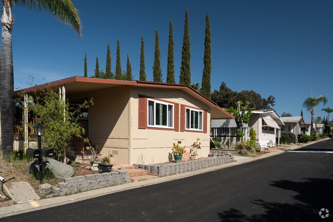 Foliage surrounding single-family homes in one of Vineyard's senior communities.