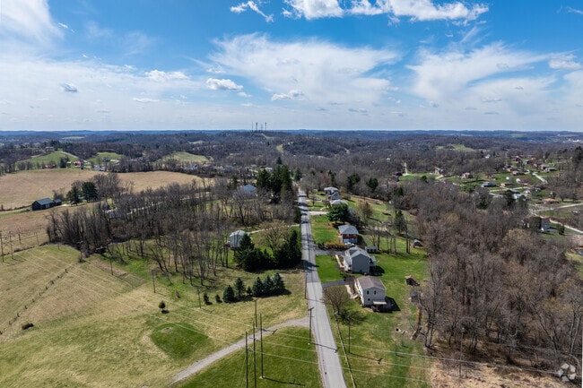 Homes line a narrow country road in Amwell Township.