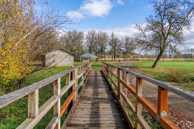 A walking trail goes around the edge of Philomath City Park in Philomath.