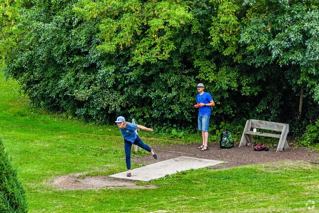 Estabrook Park’s 18-hole disc golf course winds along the Milwaukee River.