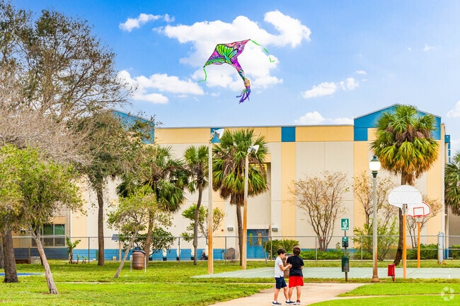 Children flying a kite in the  South End neighborhood.