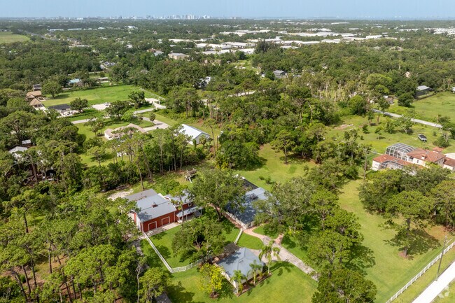 The homes in DeSoto Acres have large lots with many buildings on them.