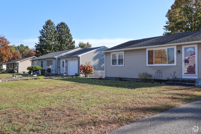 Rows of ranch-style homes line Aldenville streets.