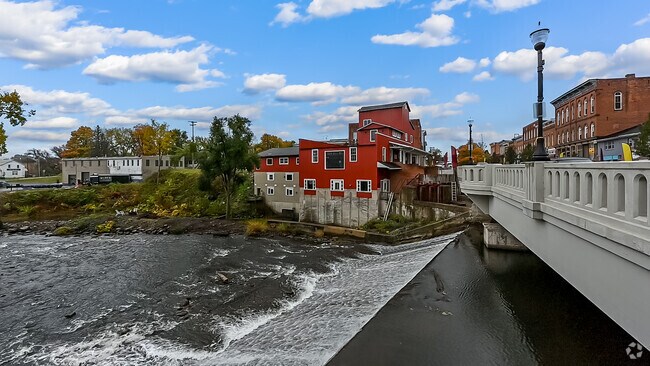 The 1927 mill sits besides  the dam along the River Raisin.