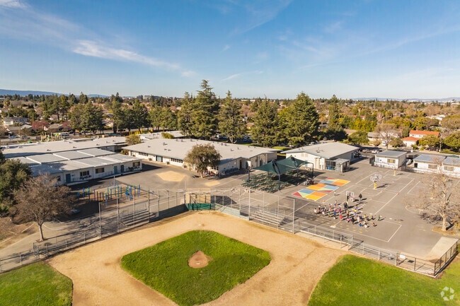 Ponderosa Elementary School offers a large playground and baseball field for students to play.