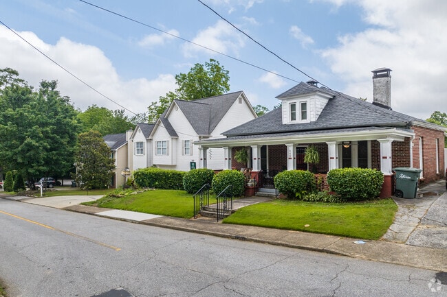 Tree-lined streets and well-maintained homes define Fort Hill-Roosevelt.
