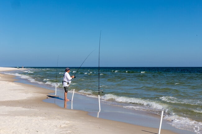 Fishermen enjoy an afternoon of surf fishing at Mobile St. Beach in Gulf Highlands.