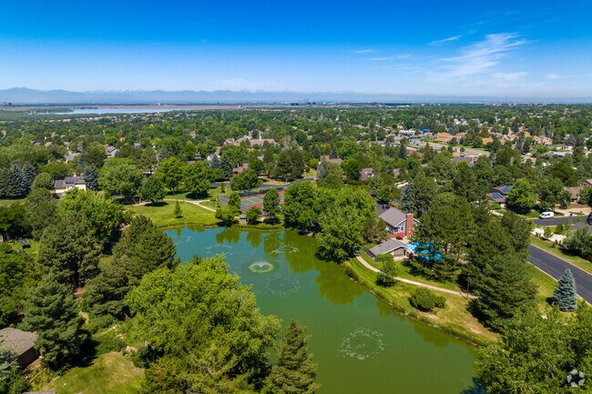 Shenandoah's gated community has charming landscaping, like a pond and greenery.