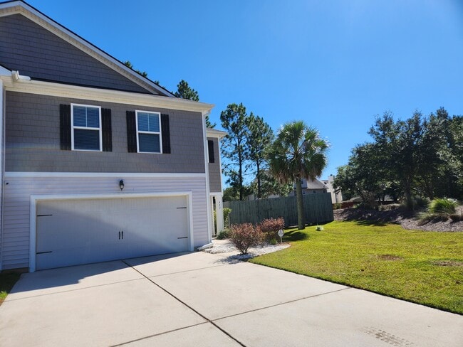 large 2-car garage, large sideyard