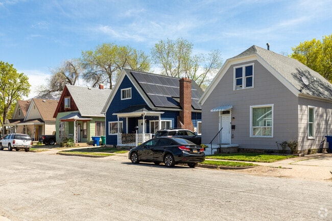 A series of homes with sloping roofs in the TO Smith neighborhood.