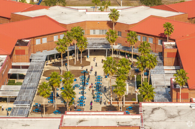 Students enjoy the fresh air between classes at Matanzas High School.