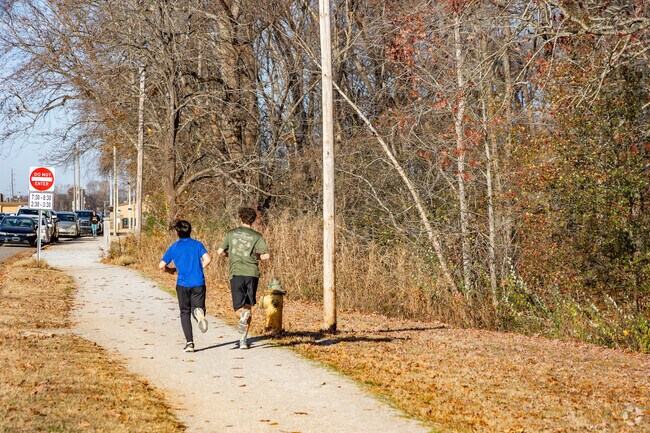 Kids of all ages love to run on the paths at Swan Creek Park near Cartwright.