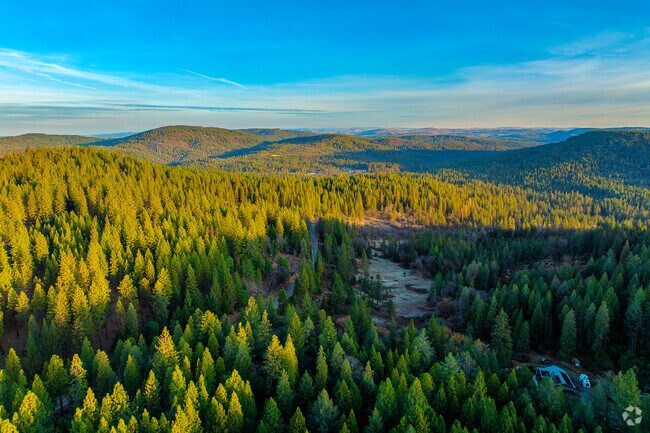 Challenge-Brownsville is surrounded by rolling hills and mountains.