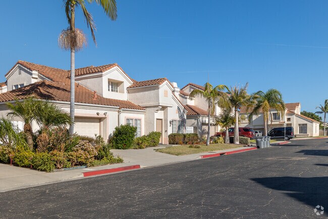 The red-tile roofs on these Spanish-inspired homes line the streets of South Winds, Oxnard.