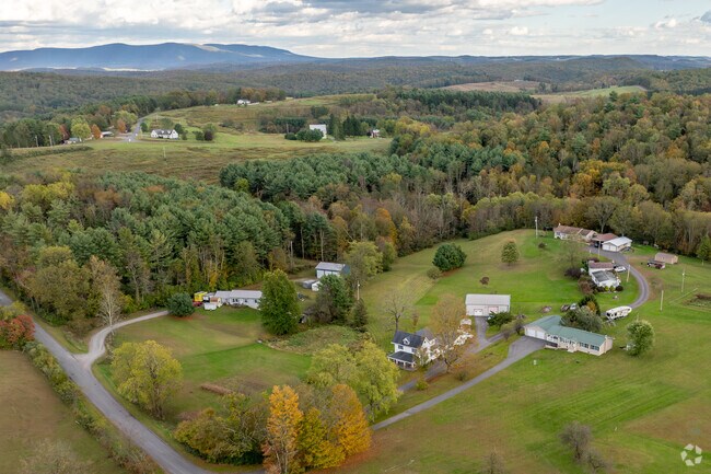 Ranch homes are available on large plots surrounded by trees and hills.