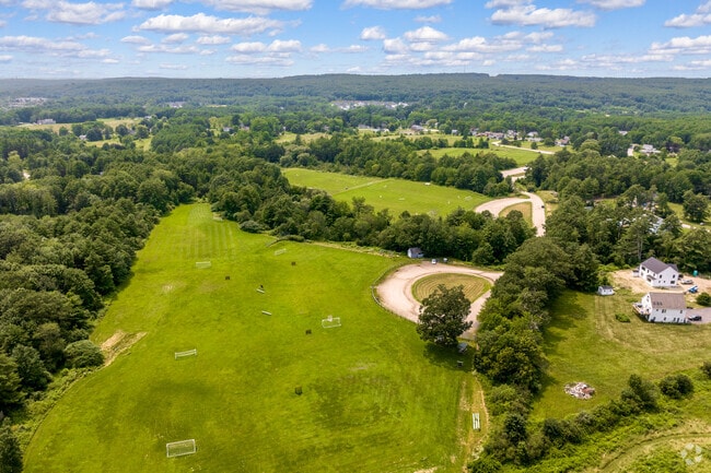 Aerial view of Falmouth Community Park's open spaces and sports fields.