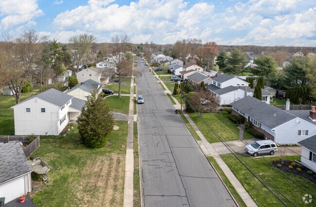Streets feature ranch-style homes, bungalows, and split-level houses.