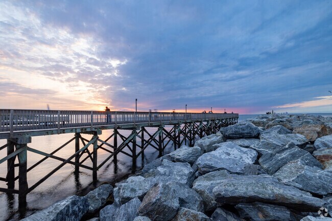 The fishing pier at Cedar West Beach is the best place to fish and watch the sunset.