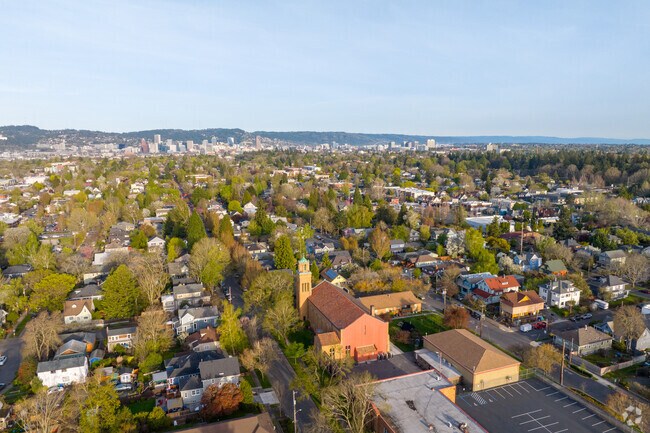 Aerial view of Sunnyside with downtown Portland visible in the distance.