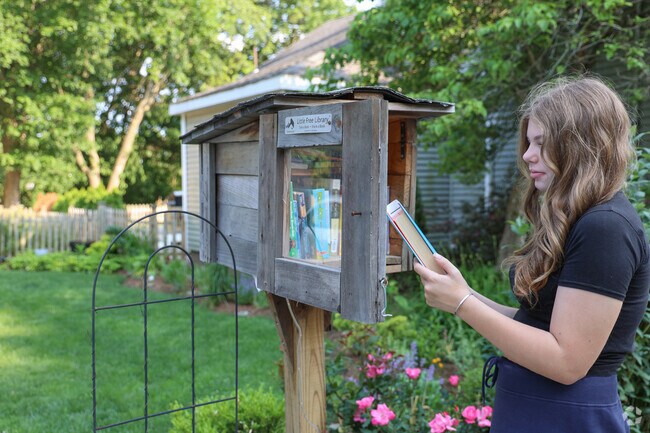 Charming Little Library stands are sprinkled throughout the Montserrat neighborhood, inviting neighbors to share and discover favorite books.
