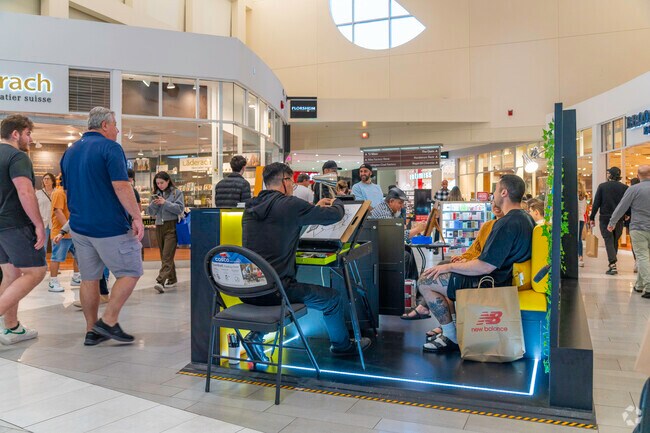 Capture moments with portrait drawing at Sawgrass Mall.