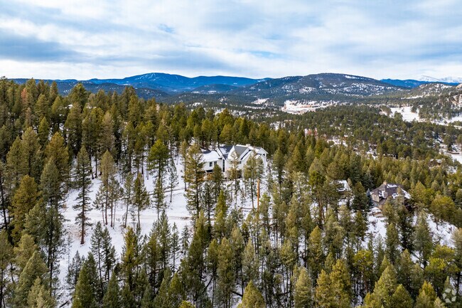 You'll find plenty of privacy with a mountain mansion on Evergreen's acre-large lot sizes.