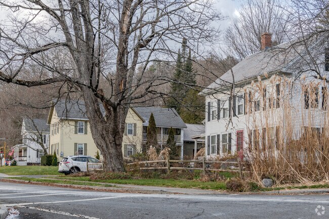 Spacious antique homes line the side roads of Conway near Route 116.
