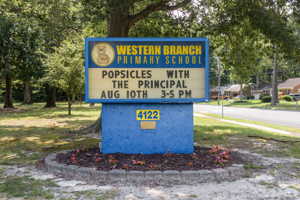 Western Branch Primary School signage displays school news and updates.