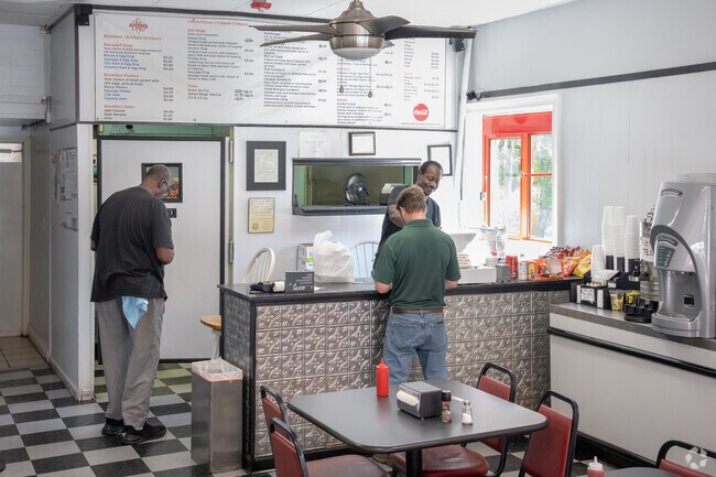 Andrew's Atomic Dogs is a small dine in restaurant right outside of a paved hiking trail.