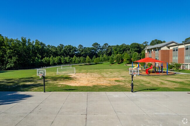 A basketball court, soccer field, and a playground are all at Vickery Mill Elementary School.