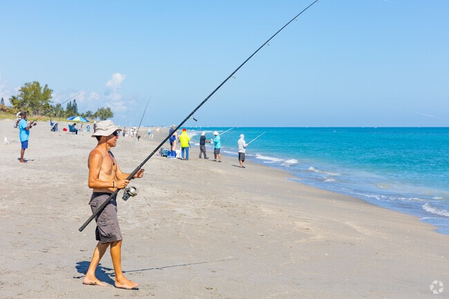 Hobe Sound fisherman enjoys a day of fishing at the beach.