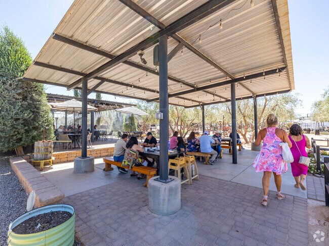 Queen Creek Olive Mill's commitment to sustainability and local sourcing resonates with the environmentally conscious community of Charleston Estates.