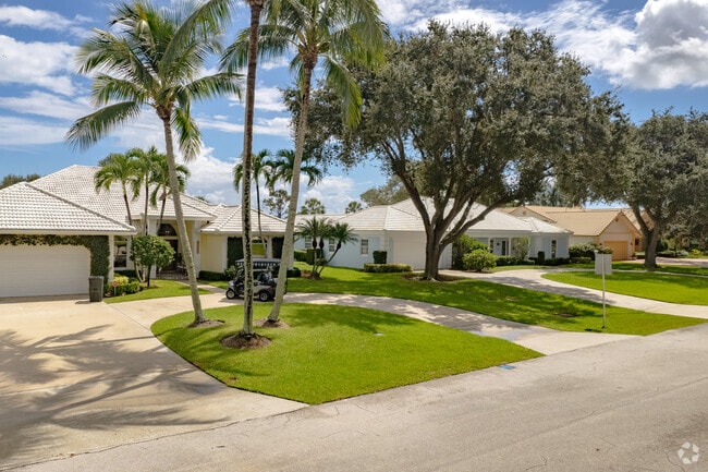 Ranch-style homes line quiet streets in Ballenisles, Palm Beach Gardens.