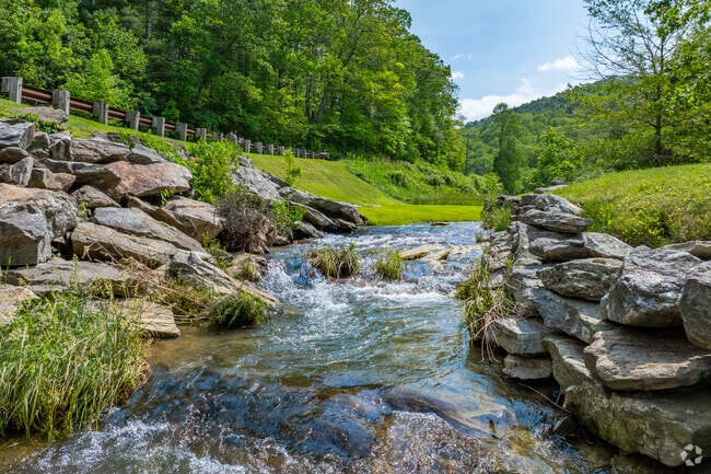 The Appalachian Mountains near Vilas, NC, feature ancient, rolling peaks covered in dense hardwood forests and rich biodiversity.