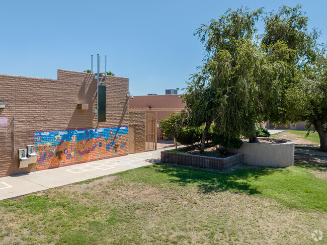 Murals line some of the outside walls of Tomahawk Elementary School.