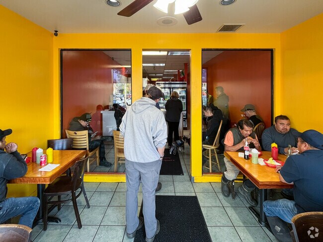 People line up to order at Taqueria La Marquesa on S State St near Dunthorpe.