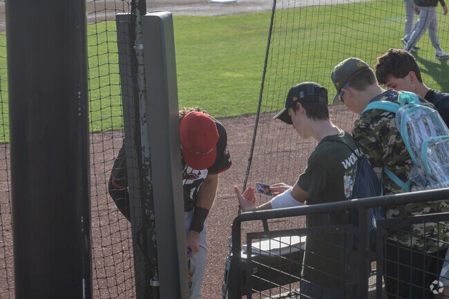 East Juniata kids enjoy getting baseball players to autograph cards at Altoona Curve Baseball.