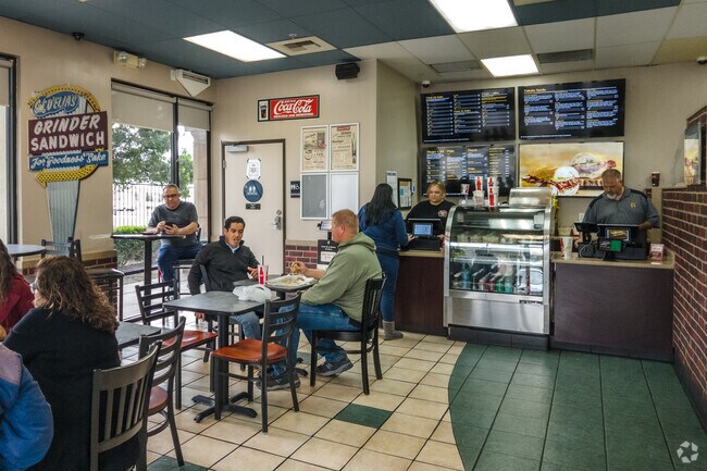 Customers enjoying lunch at D'elia's Grinders in Orangecrest.