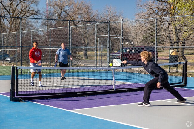 Get your friends together for a game of pickleball at Sedgwick County Park near Sherwood Glen.